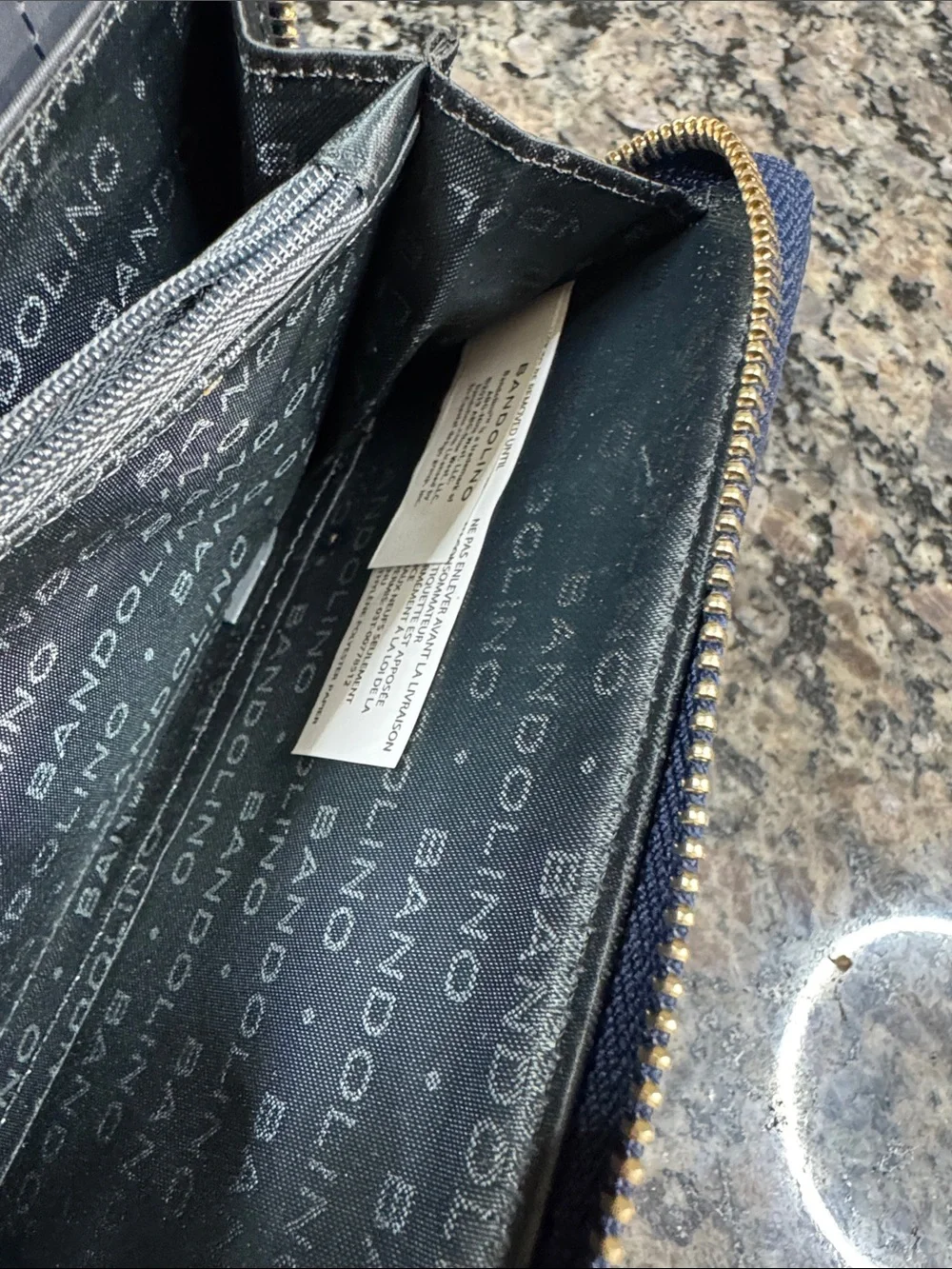 Bandolino Navy Pebbled Zip Wristlet with Gold Plaque